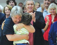 Engstrom hugs her granddaughter after receving a Bob's Award.